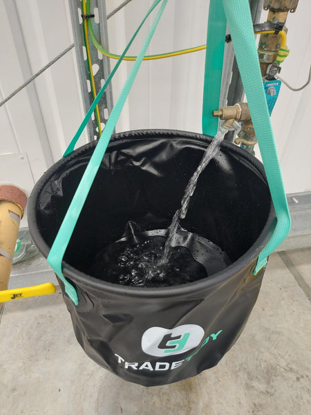 water pouring in a TradeTidy collapsible bucket