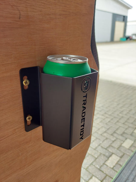 Black can holder with 'TradeTidy' branding on a wooden surface