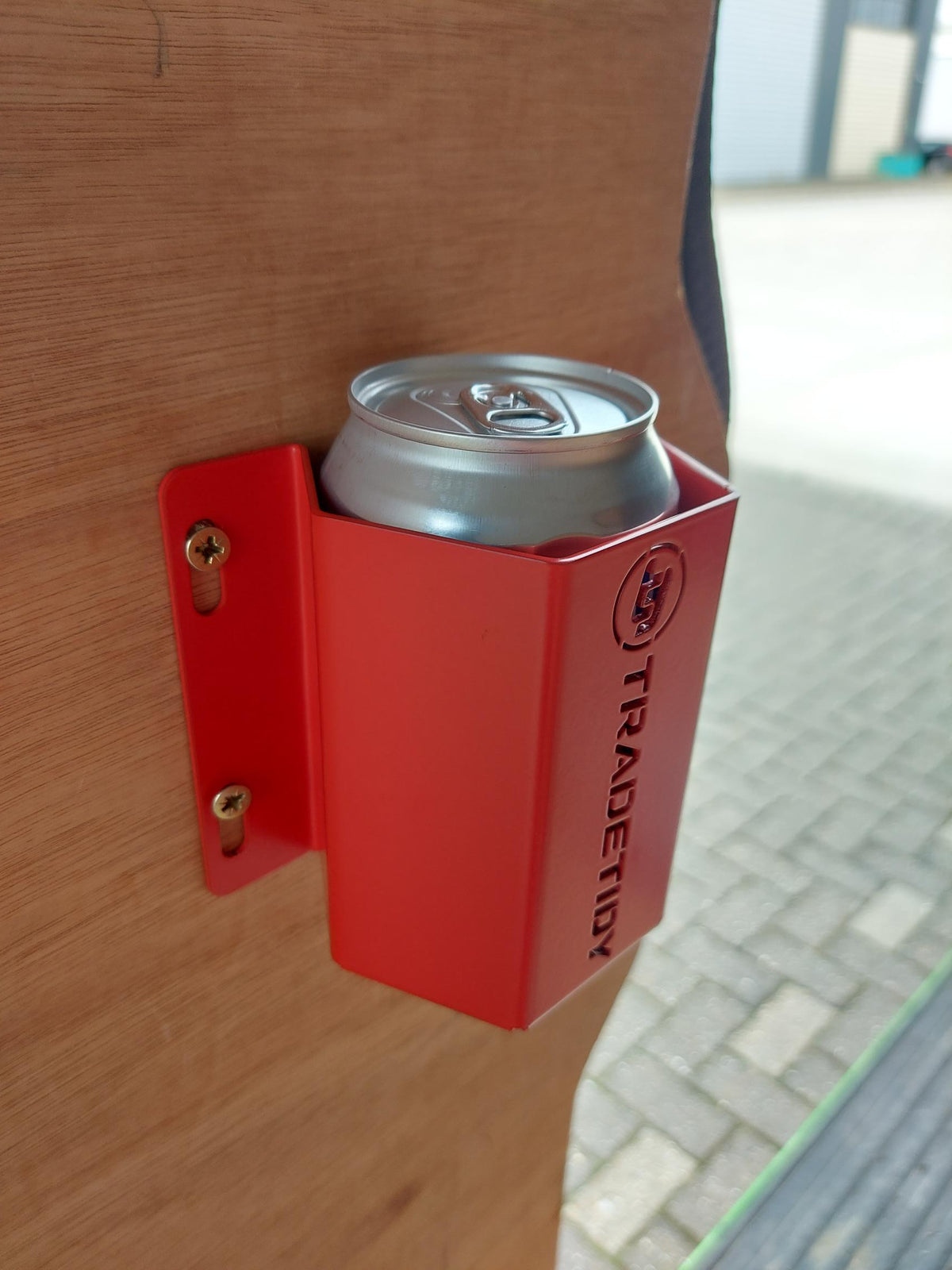 TradeTidy - Red can holder with a can on a wooden surface