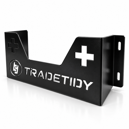 TradeTidy black first aid kit holder with cut-out cross — wall-mounted steel bracket for vans and workshops