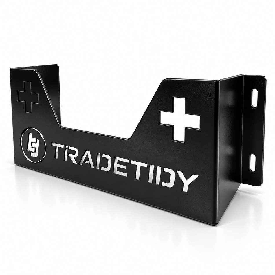 TradeTidy black first aid kit holder with cut-out cross — wall-mounted steel bracket for vans and workshops