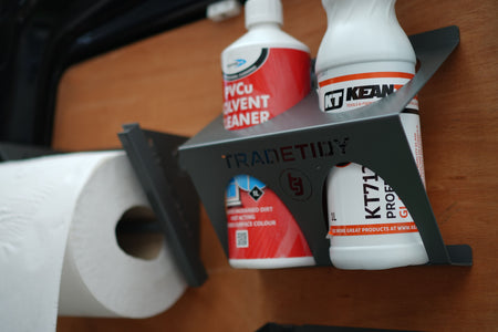 TradeTidy - Solvent in a grey glass solvent holder mounted on a workshop van's door