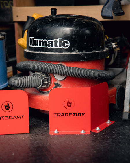 TradeTidy - Vacuum Cleaner Secured by a Red Bucket Brackets