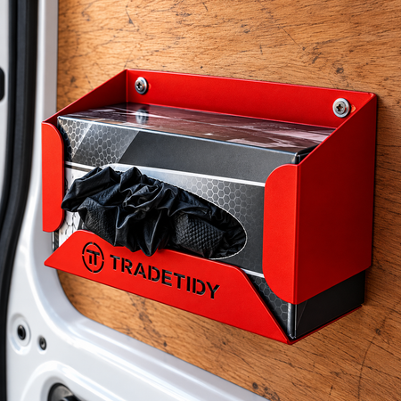 TradeTidy red Glove Box Holder fitted to the plywood lining inside a work van with gloves ready to pull