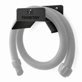 TradeTidy black Hose Holder XL with a coiled dust-extractor hose - wall-mounted steel hose bracket for vans and workshops