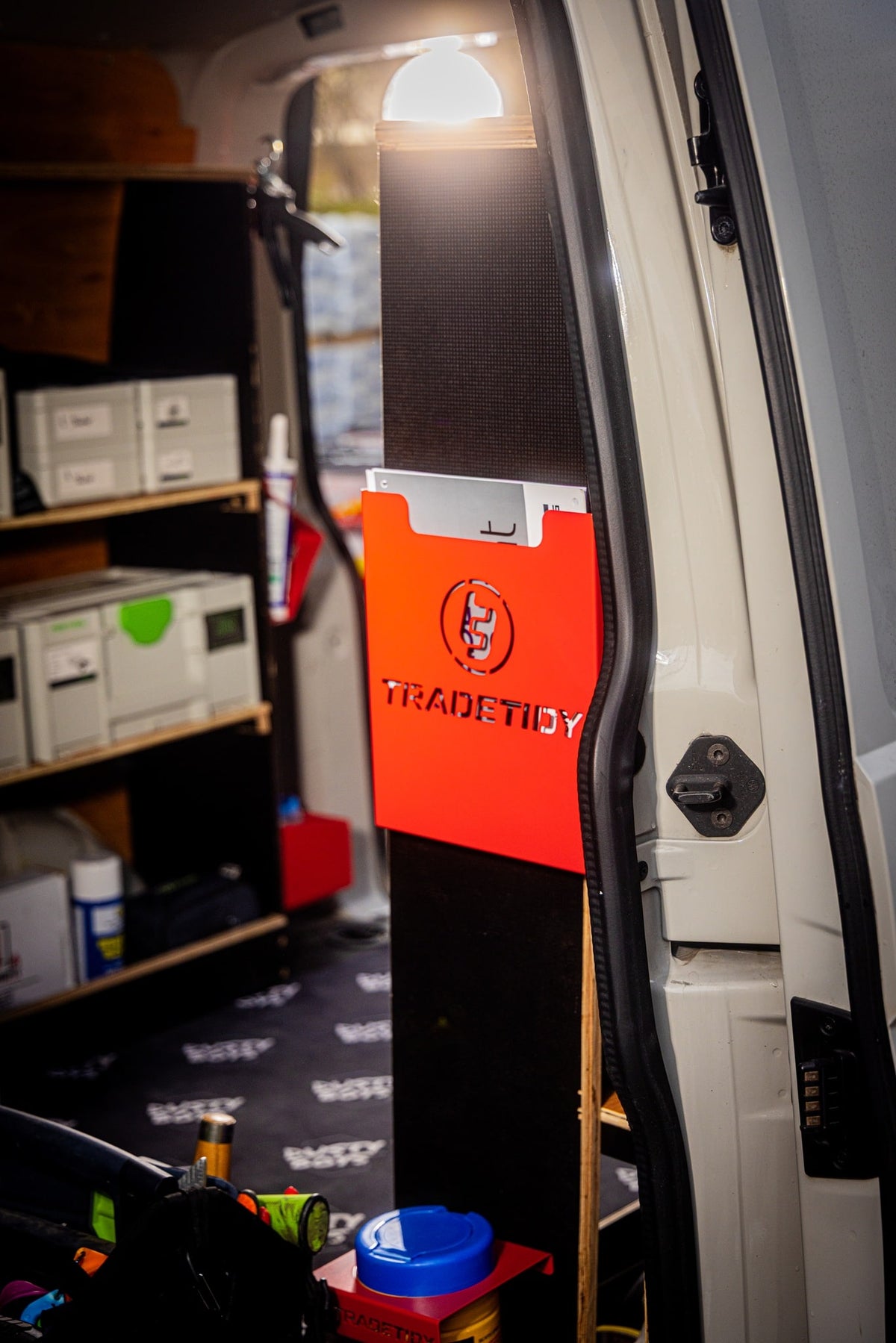 TradeTidy - Red Document Holder Mounted on a Workshop Van