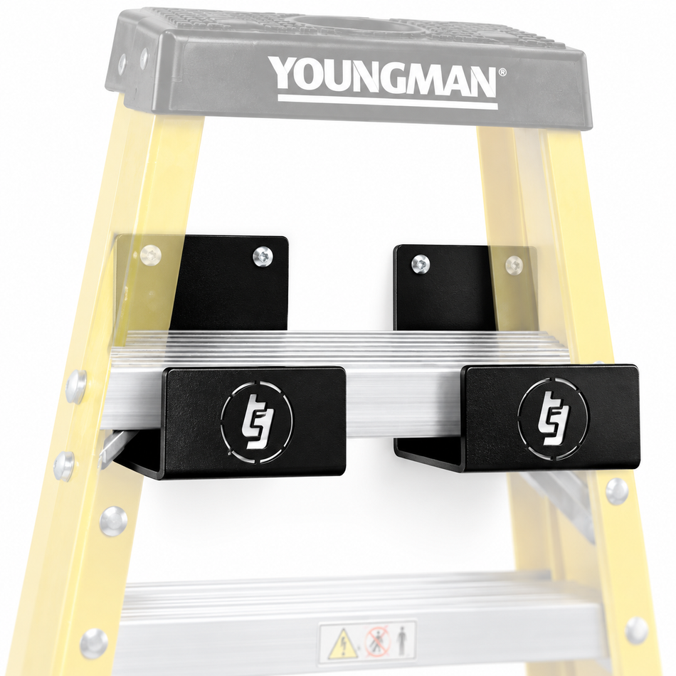 TradeTidy black ladder brackets (pair) fitted to a yellow Youngman step ladder — van and workshop ladder storage