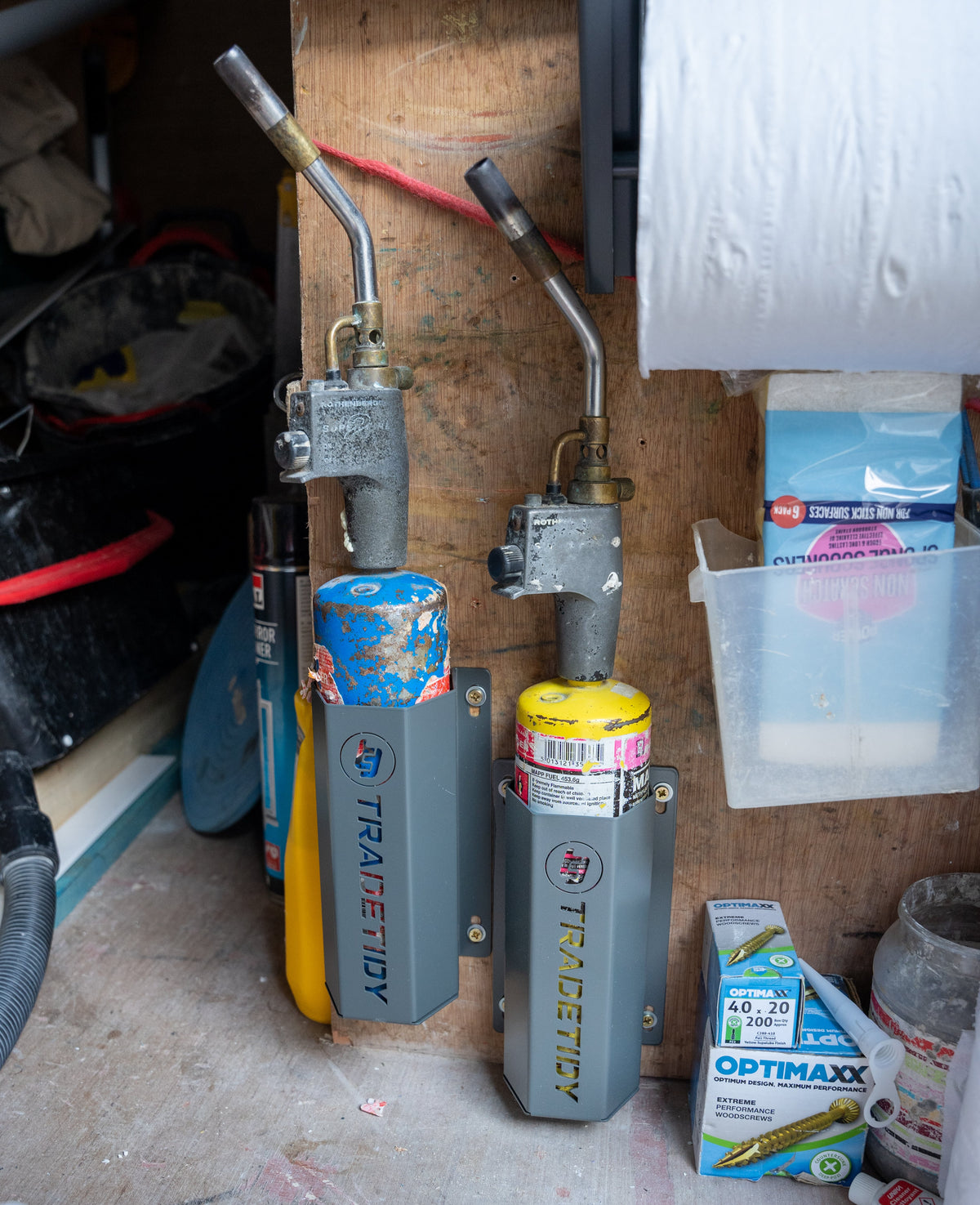 TradeTidy - Propane Gas in a grey Propane/MAPP Gas Can Holder in a workshop settings