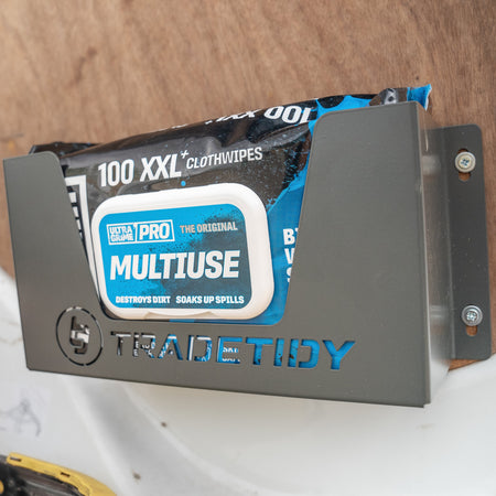 TradeTidy - Black Ultragrimes Wipes in a Garay Wipes Holder Mounted on a Wooden Wall